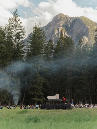Hunter Noack playing piano in Wallowa Lake State Park