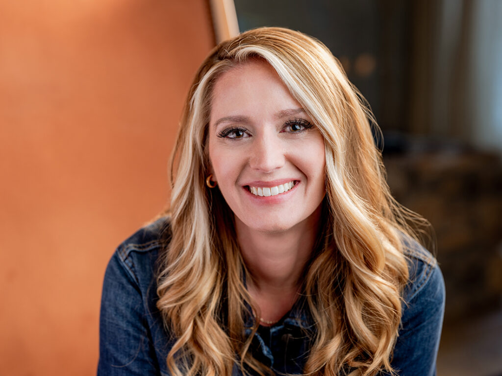 Amy somerville wearing denim shirt